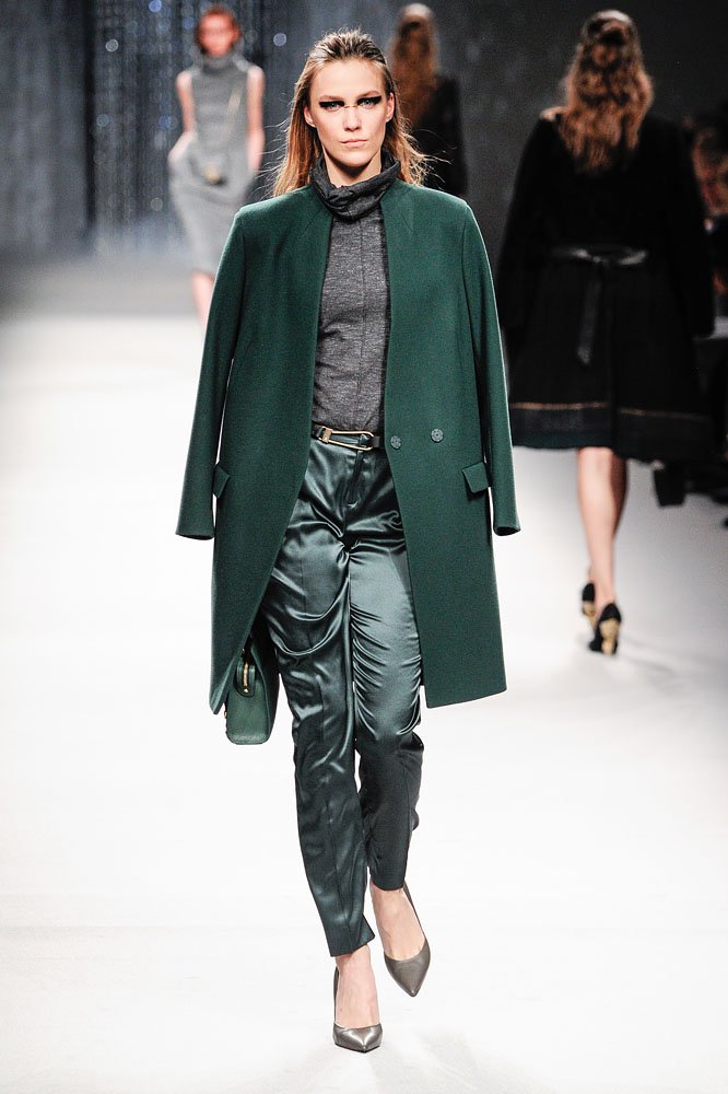 Milan, IT - - A model walks the runway at the Aigner Fall/Winter 2016 fashion show during Milan Fashion Week.